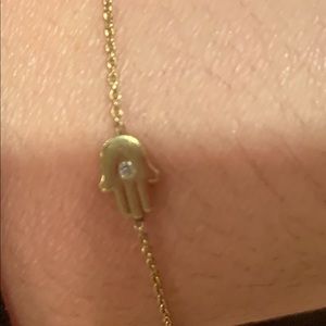 Small 18k gold with tiny diamond hamsa bracelet